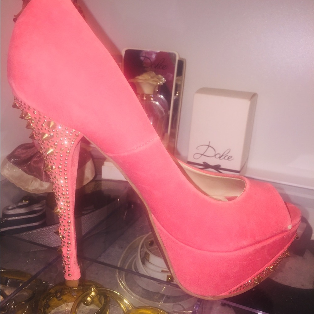 Pink high heel shoe with gold studs